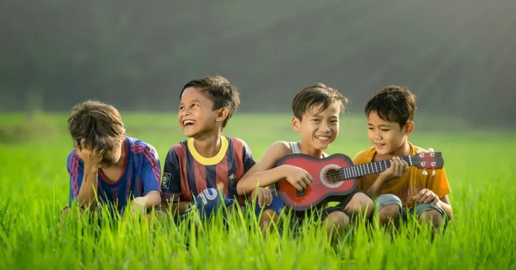 Kids playing guitar