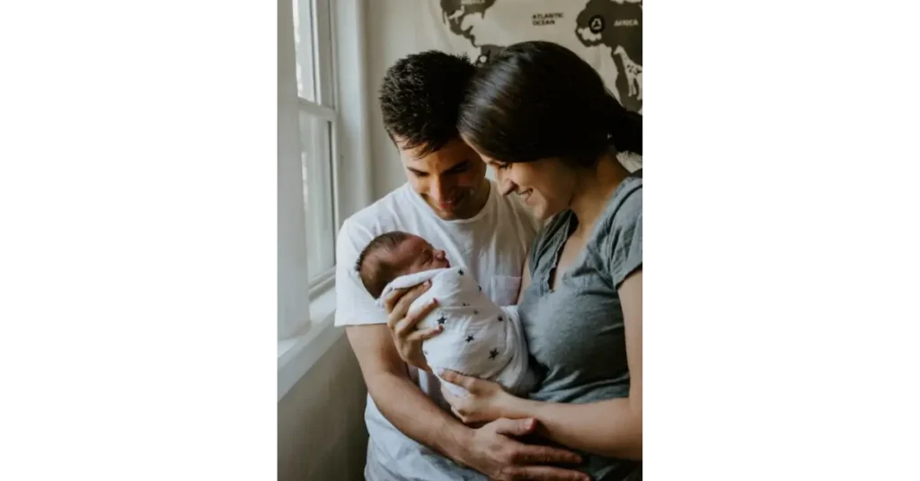 Family holding her baby