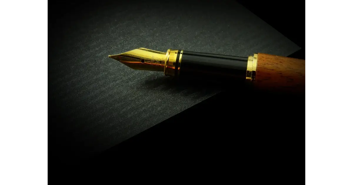 Golden pen on a desk