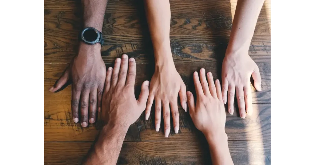 Hands of Friends on a table