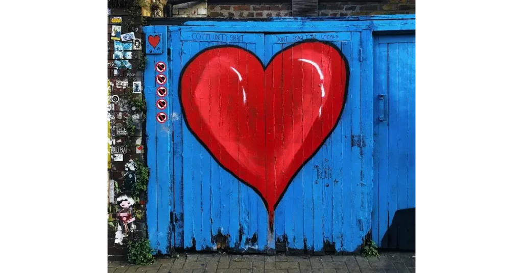 Red heart on blue wall
