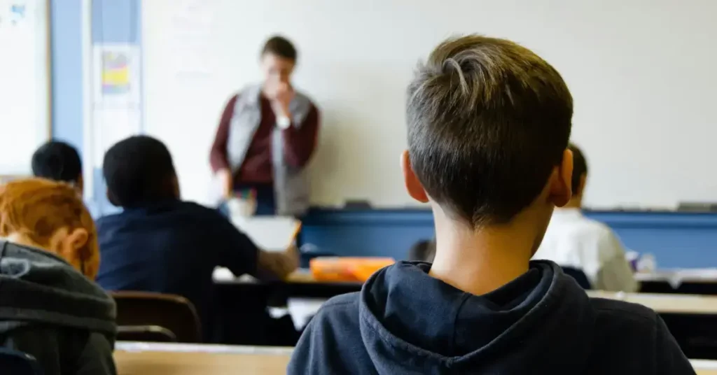 Students Listening to his teacher