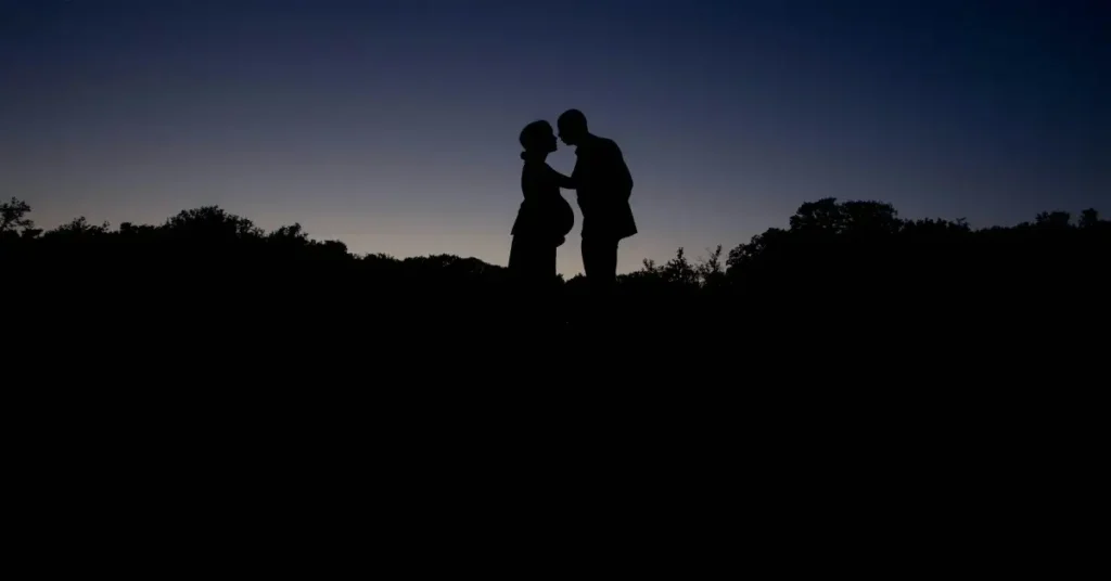 Pregnant Couple at Sunset